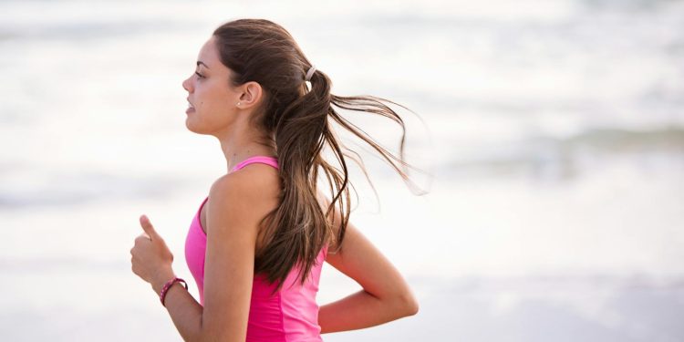 Selective Focus Photography Of Woman In Pink Shirt