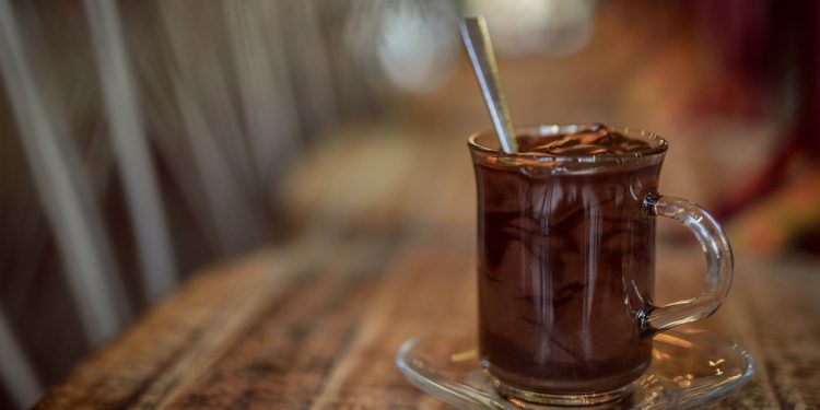 Close-Up Photo Of Glass Mug Filled With Chocolate Drink
