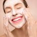 Woman With White Facial Soap on Face