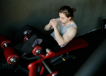 Man Exercising at a Gym
