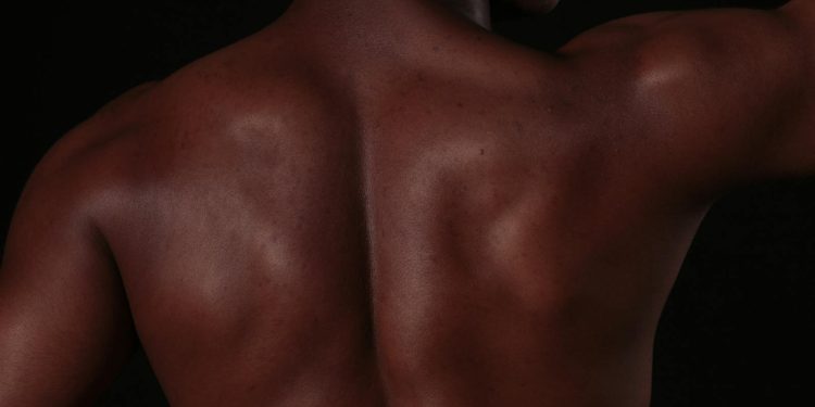 Photo of a Person's Back