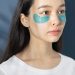 A Woman With Under Eye Patches