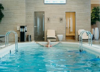 A Woman Swimming in the Pool