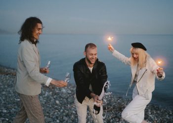 A Group of Friends Celebrating at the Beach