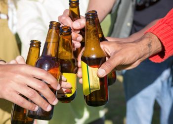People Toasting with Their Beer