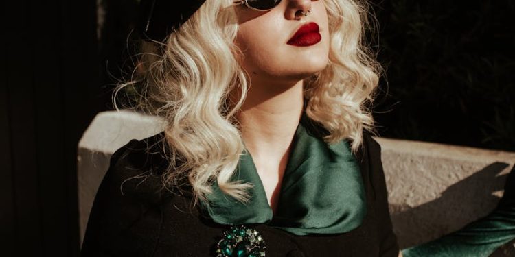 Blonde Woman with Red Lipstick Wearing Black Sunglasses