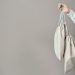 Person Holding White Leather Tote Bag